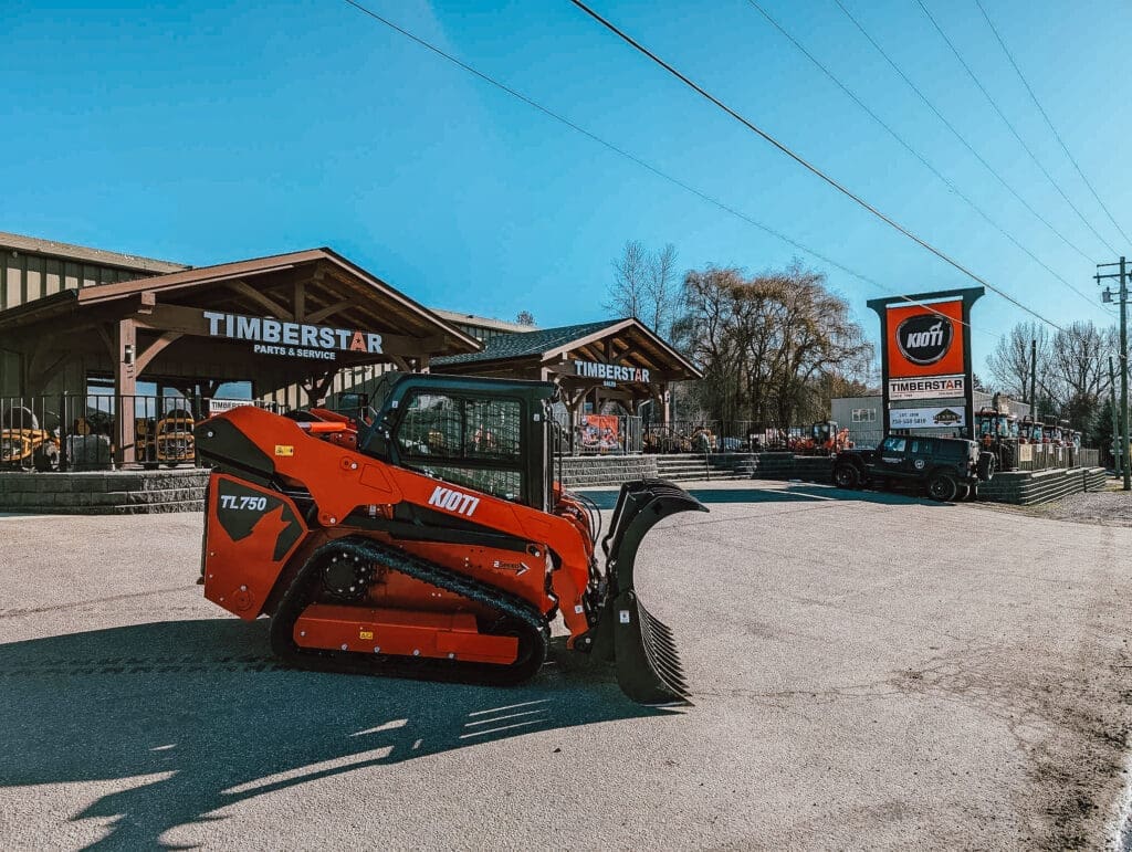 A KIOTI TL750 Skid Steer attachment